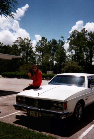 C.J. Carter-Stephenson with an old family car in Naples, Floria.