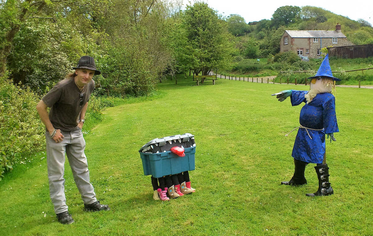 C.J. Carter-Stephenson with Terry Pratchett themed scarecrows.