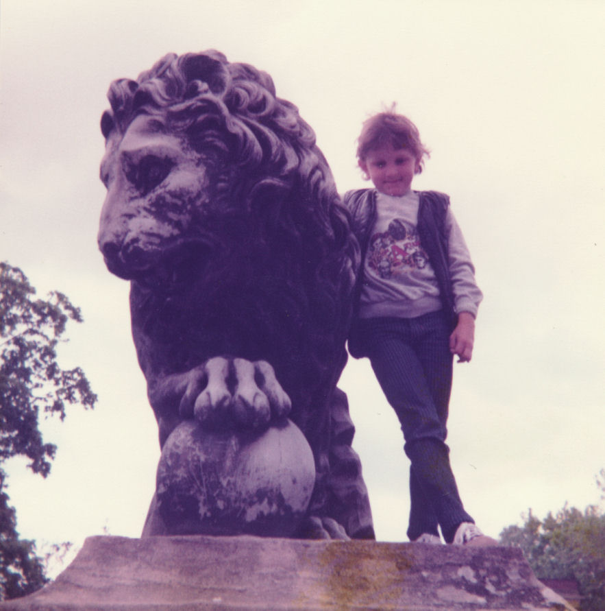C.J. Carter-Stephenson with stone lion.